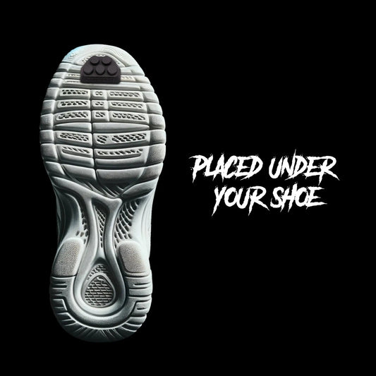 Close-up of CoreV5 Stealth Foot Sliders attached to a running shoe.